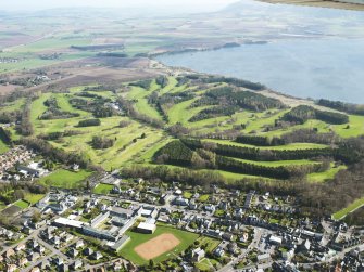 General oblique aerial view of Kinross centred on the Montgomery Golf Course, taken from the W.