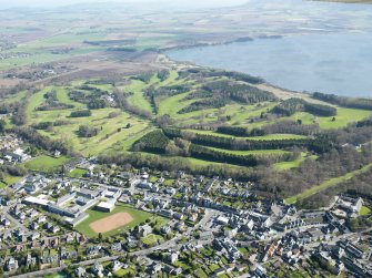 General oblique aerial view of Kinross centred on the Montgomery Golf Course, taken from the WSW.