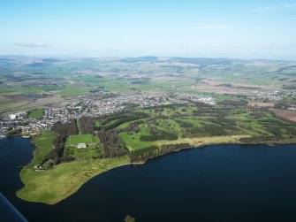 General oblique aerial view of Kinross centred on the Montgomery Golf Course, taken from the E.