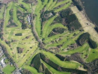 Oblique aerial view of the Bruce Golf Course, Kinross, taken from the SW.