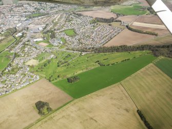 Oblique aerial view of Cupar Golf Course, taken from the SSE.