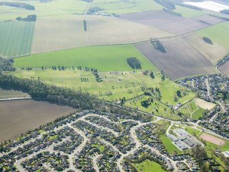 Oblique aerial view of Cupar Golf Course, taken from the NNE.