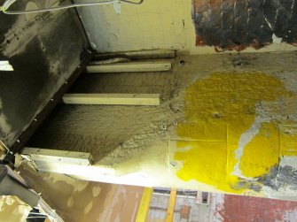 Interior. View of Building 1A1, south west end. Note the original masonry stairwell wall. This appears to have been superceeded by the building of Building 3 after 1898. The bricks on the left are similar to Building 2.