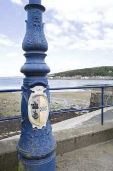 Detail of Victorian lamp standard with town coat of arms on Argyle Place, Rothesay, Bute