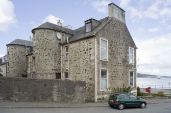 View of rear elevation of 1 and 2 Argyle Place, Rothesay, Bute, from SW