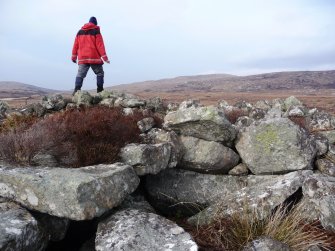 View from S showing corbel stones of chamber.