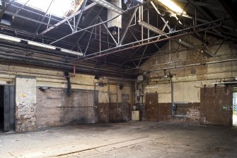 Interior. Former boiler room area, from S. Post 1913.