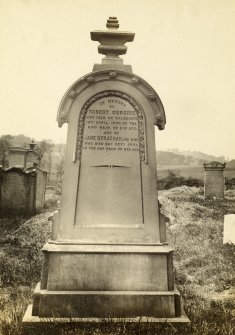View of gravestone in Mearns Parish Kirk graveyard. 
Titled: '4th July 1890'. 
The inscription reads: 'In memory of ROBERT OSBORNE who died at Caldcoats, 19th April 1870, in  the 84th year of his age, and of JANE STRACHAN, his wife wo died 22nd oct 1871, in the 82d year of her age'. 


