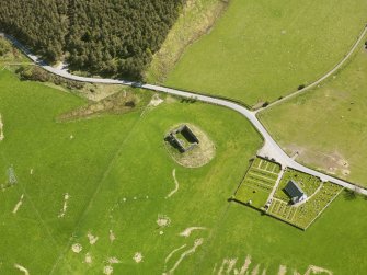 Oblique aerial view of Abernethy Parish Church and Castle Roy, taken from the W.