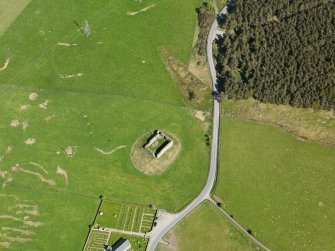 Oblique aerial view of Abernethy Parish Church and Castle Roy, taken from the SSW.