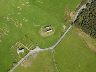 Oblique aerial view of Abernethy Parish Church and Castle Roy, taken from the SSE.