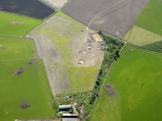 Oblique aerial view of Birnie site under excavation, taken from the NNW.
