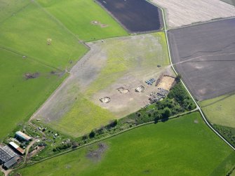 Oblique aerial view of Birnie site under excavation, taken from the NW.