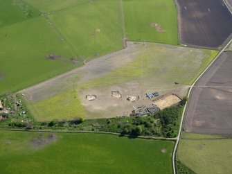 Oblique aerial view of Birnie site under excavation, taken from the WNW.