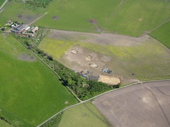 Oblique aerial view of Birnie site under excavation, taken from the SW.