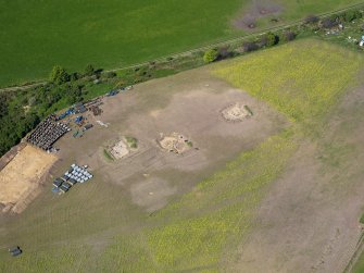Oblique aerial view of Birnie site under excavation, taken from the SE.