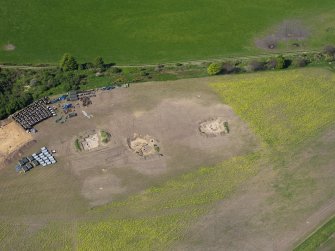 Oblique aerial view of Birnie site under excavation, taken from the ESE.