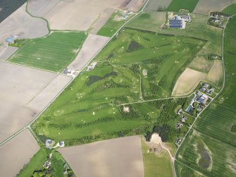Oblique aerial view of Kinloss Country Golf Course, taken from the SW.