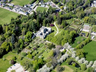Oblique aerial view of Cawdor Castle and policies, taken from the SE.
