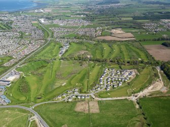 General oblique aerial view of Inverness, centred on Loch Ness Golf Course, taken from the SW.