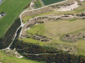 Oblique aerial view of Castle Stuart Golf Course, taken from the WNW.