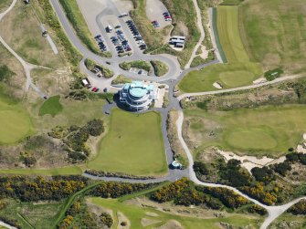 Oblique aerial view of Castle Stuart Golf Course, taken from the WNW.