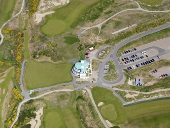 Oblique aerial view of Castle Stuart Golf Course, taken from the SSW.