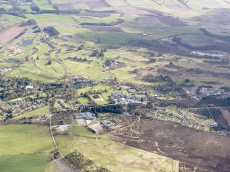 Oblique aerial view of Gleneagles Hotel and golf courses, taken from the NNW.