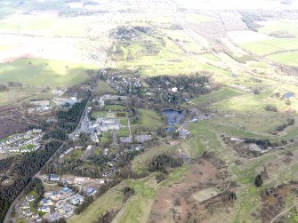 Oblique aerial view of Gleneagles Hotel and golf courses, taken from the WSW.
