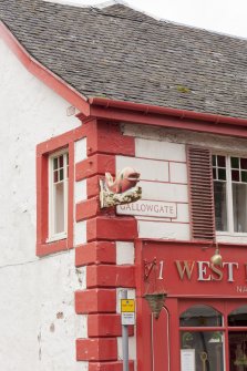 Detail of fish sculpture sign advertising the West End Cafe, 1 and 3 Gallowgate, Rothesay, Bute