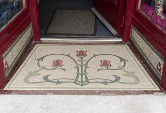 Detail of tiling at shop front entrance to 39 Victoria Street, Rothesay, Bute
