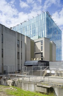 View of QML and new library showing pyramid skylights on QML foyer.