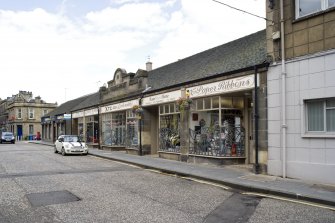 General street view showing 24-34 South Street, Bo'ness, taken from the North-West. This photograph was taken as part of the Bo'ness Urban Survey to illustrate the character of the Town Centre Area of Townscape Character.