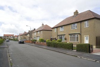 General street view of 25-43 Graham Crescent, Bo'ness, taken from the South-East. This photograph was taken as part of the Bo'ness Urban Survey to illustrate the character of the Forthview and Grahams Crescent Area of Townscape Character.