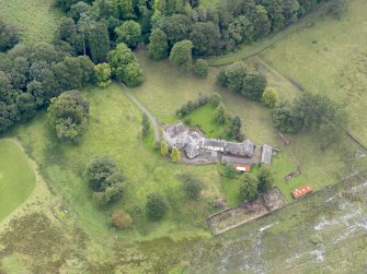 Oblique aerial view of Closeburn Castle, taken from the NW.