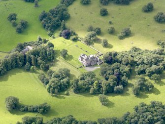 Oblique aerial view of Capenoch House and stables, taken from the NNE.