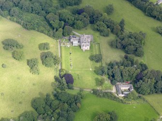 Oblique aerial view of Capenoch House and stables, taken from the SSE.