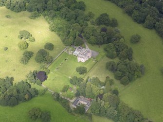 Oblique aerial view of Capenoch House and stables, taken from the SE.