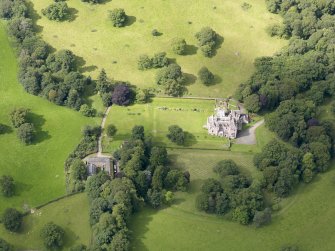 Oblique aerial view of Capenoch House and stables, taken from the ENE.