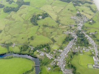 General oblique aerial view of St John's Town of Dalry and Kenbank House, taken from the SW.