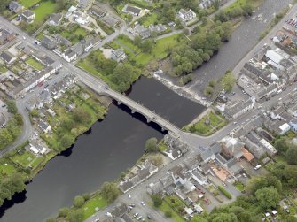 Oblique aerial view of Newton Stewart, centred on the Bridge of Cree, taken from the WNW.