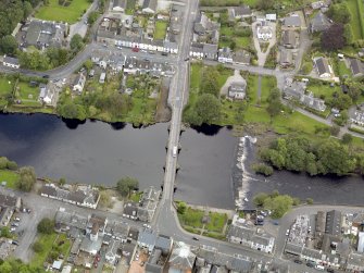 Oblique aerial view of Newton Stewart, centred on the Bridge of Cree, taken from the WSW.