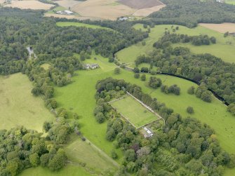 General oblique aerial view of Bargany House and policies, taken from the ESE.