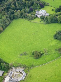 Oblique aerial view of Kirkdale House and Mains, taken from the NW.