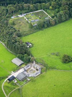 Oblique aerial view of Kirkdale House walled garden and Mains, taken from the WNW.