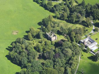 Oblique aerial view of Gelston Castle and policies, taken from the W.