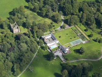 Oblique aerial view of Gelston Castle and policies, taken from the WSW.
