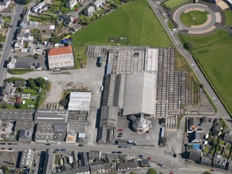 Oblique aerial view of Castle Douglas cattle market, taken from the WNW.