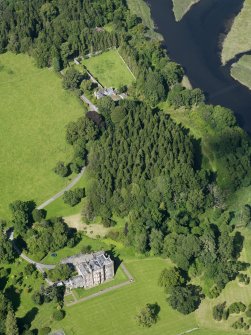 General oblique aerial view of Cumstoun House and policies, taken from the SSW.