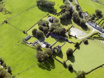 Oblique aerial view of Dundrennan Abbey, taken from the ENE.